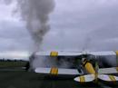 J1211 on Gisborne runway next to tiger moth on its GO GISGORNE trip.