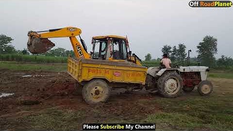 JCB Backhoe Machine Loading Mud on POWERTRAC 439 Tractor-JCB Working For Road Constructions -JCB