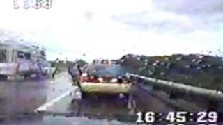 Acrobatic Police Man Avoids Crash