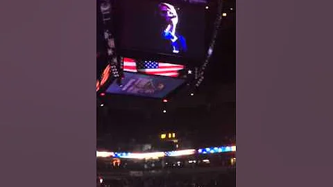 Laurie Holmberg sings the National Anthem