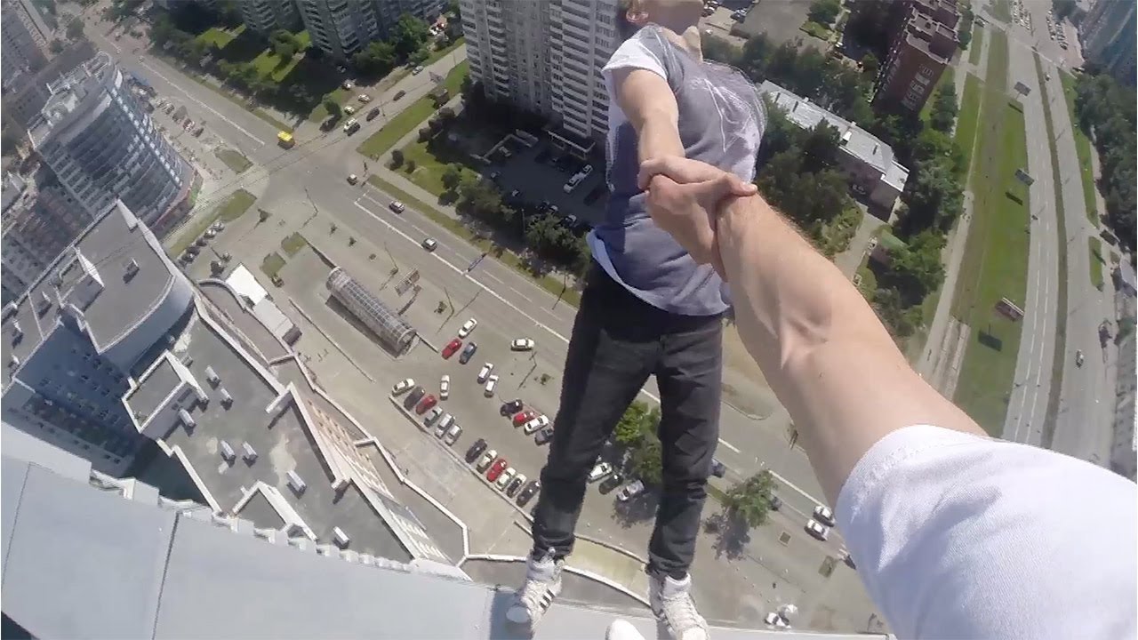 Russian Model Hangs Off Building Russian Model Hangs Off Building