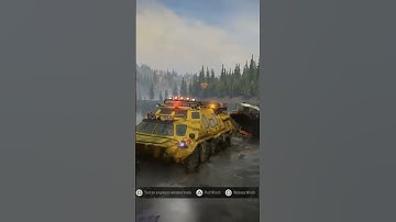 snow runner pulling a truck