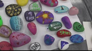 Students paint rocks to honor Faye Swetlik