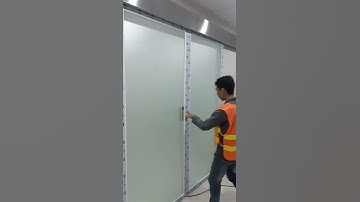 Cửa tự động hàn quốc tes bộ 2 cánh không mắt thần mà dùng khóa nhấn tay