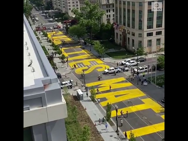 D.C. Mayor Muriel Bowser unveils large street banner reading 'Black Lives Matter' 