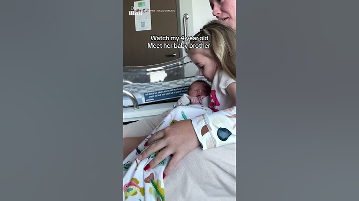 Sweet moment of baby sister meeting her baby brother for the first time