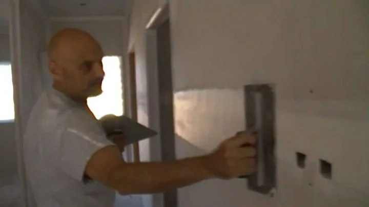 How to first coat a drywall flat joint with a hawk and trowel