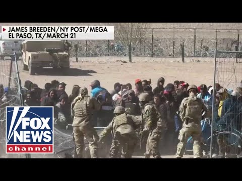 Nine migrants charged with assault, inciting a riot after storming border.