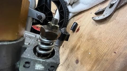 How to remove a stuck unloader valve from the power washer pump.