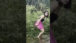 outdoor a girl open her dress