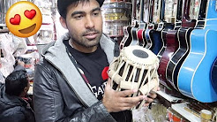 Buy Guitars In Cheap [sitar, drum, harmonium] | Musical Instruments
