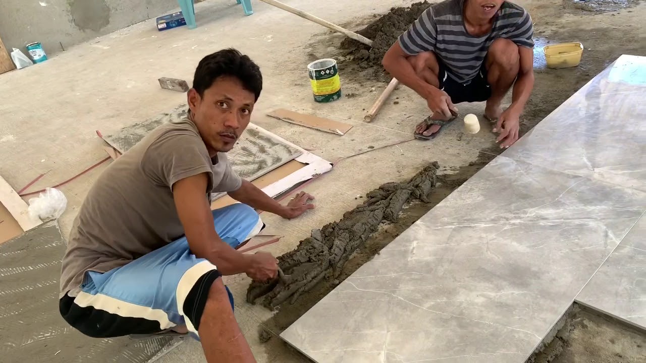Installing our kitchen tiles -construction in the Philippines - YouTube