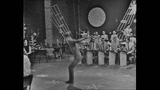 Backward flip with frontbend, 1963