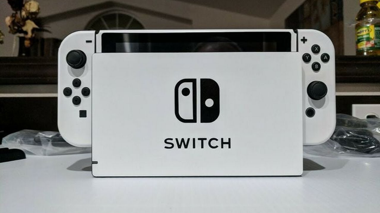 White nintendo. Игровая приставка Nintendo Switch OLED. Nintendo Switch белый. Nintendo Switch OLED model белая. Игровая консоль Nintendo Switch 32 GB.