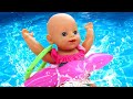 Baby Born doll plays in a ball pit &amp; toy slide. Pretend play with toys. Baby dolls videos for kids.