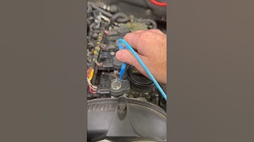 Quickly check ignition coil trigger and spark using the oscilloscope, a coin, and back probe.