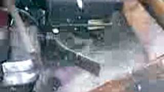 unloading salt spreader into skidsteer bucket