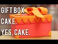 How to Make A GIFT BOX out of CAKE!! Chocolate, BUTTERCREAM, and pink and orange fondant