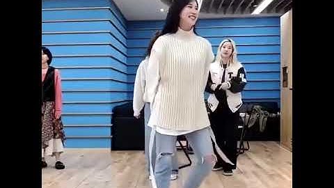 mina doing a perfect heel click in the air, and then there
