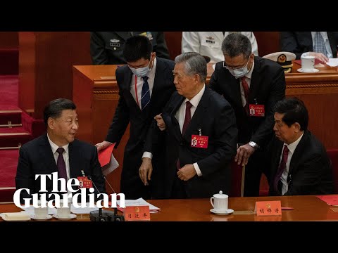 Former chinese president hu jintao unexpectedly led out of party congress
