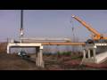 Jcrane sets bridge beams over railroad