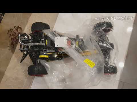 Unboxing Rovan baja RC car 1/5 scale and breaking in, فتح صندوق سيارة ريموت كنترول وتشغيل اول مرة