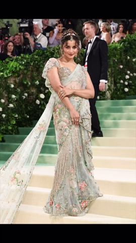 Alia Bhatt arrived at the #MetGala 2024 in a Sabyasachi sari with a 23-foot-long train | Vogue India
