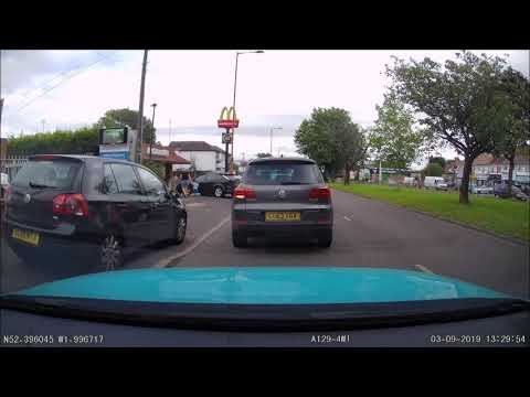 Reckless motorist swerves off road and on to pavement - just to beat queue for McDonald's