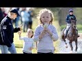 Mia enjoys an ice cream with mum Zara during day out at Gatcombe Park Horse Trials