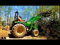 John Deere Tractor with Grapple Bucket: Cleaning up Trees