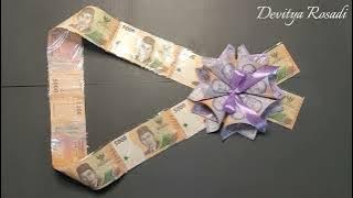 Selempang/kalung dari Uang untuk hadiah wisuda Ponakan