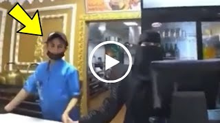 شاهد بالفيديو لحظة قيام شاب يمني بالتحرش بموظفة سعودية منقبة في مطعم بالسعودية و لحظة القبض عليه