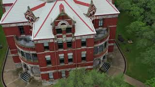Drone view of Historic Lee County Courthouse in Downtown Giddings Texas