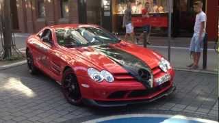 Again red/black mercedes slr mclaren in frankfurt - parking, open
door, interior