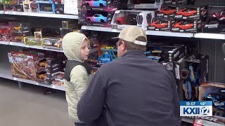 Madill first responders take local children Christmas shopping in annual Shop with a Hero event