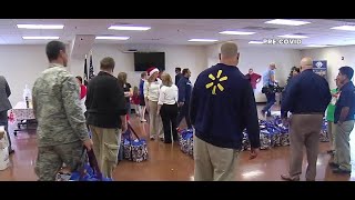 Operation Homefront distributes hundreds of meals and toys
