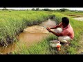 Fishing  skilled boy fishing with a hook in the village canal  best hook fishing