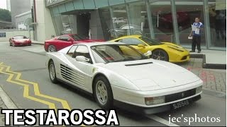 I film a white ferrari testarossa, similar to that from the ''miami
vice'' tv series, driving around singapore's ital auto and doing some
small revs.