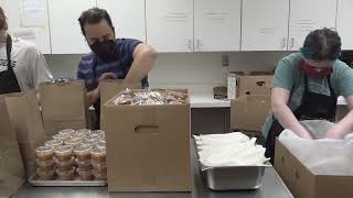 Neighborhood volunteers serve hot meals to Minneapolis community