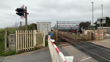 Passing through here is 802109 on 2P12 to Plymouth 11/8/23 passing longrock railway crossing