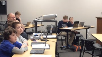 Kids learn computer coding in Highland