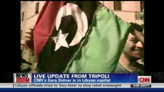 Tensions high, looting begins in Libya