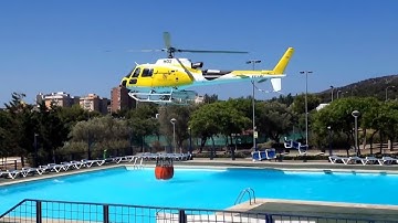 Fire Helicopters Filling Their Water Buckets From Pools