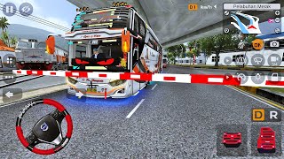 Paradise PO Haryanto Tourist Bus Waits for Train to Pass at Bakauheni Port screenshot 4