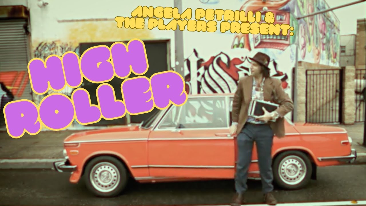 Angela Petrilli & The Players - High Roller - (Official Music Video) adlı videoyu YouTube'da izle Angela Petrilli & The Players - High Roller - (Official Music Video) adlı videoyu YouTube'da izle