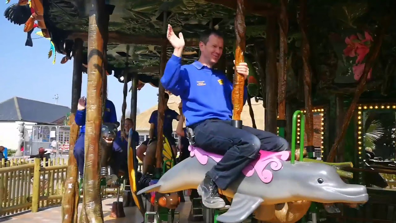 Drusillas Park staff ride the new Rainforest Carousel!