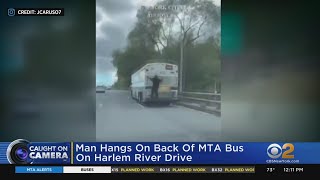 Man Seen On Video Hanging From MTA Bus