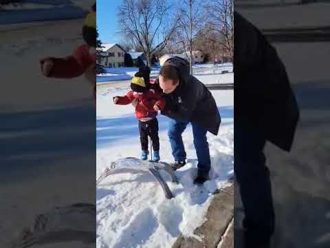 Dad Playfully Makes Toddler Stand Over Frozen Onesie