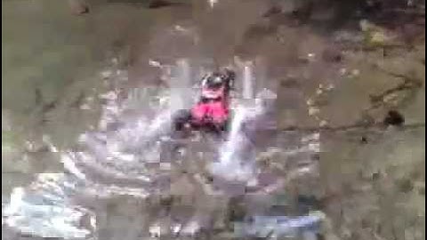 rc18t going for a quick blast in the river
