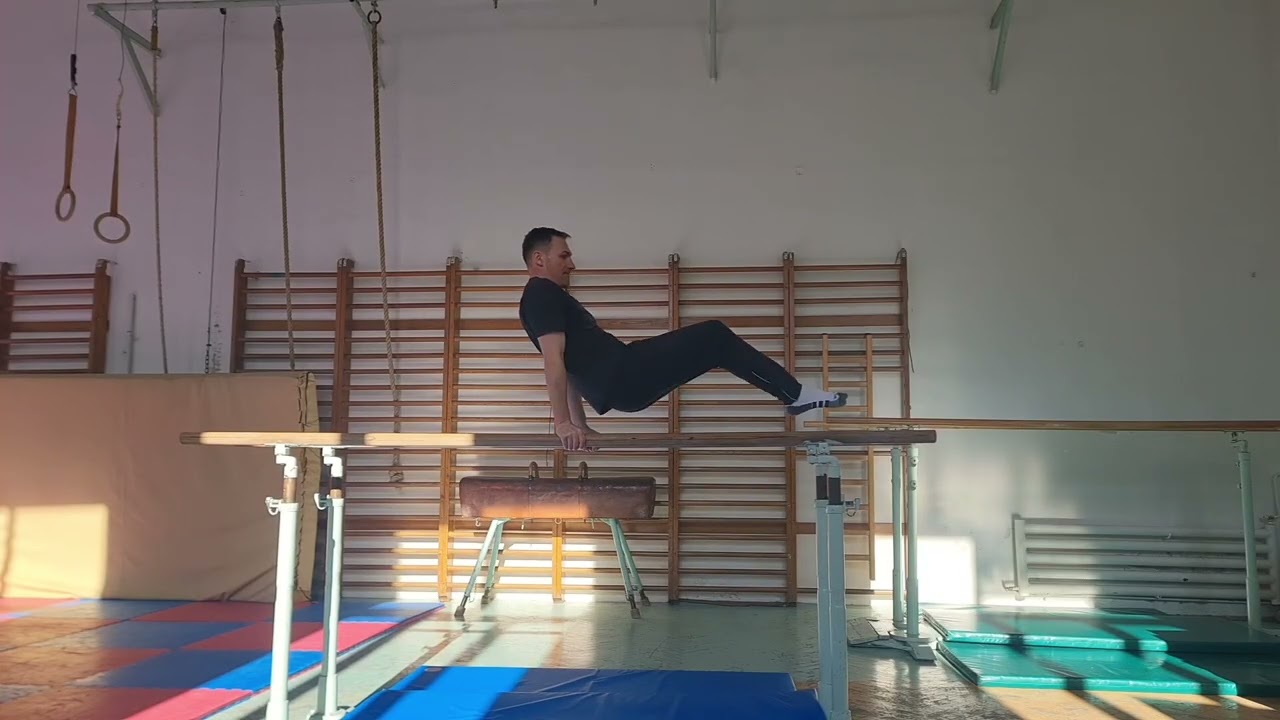 Acomodarea cu efortul în sprijin la paralele.